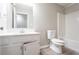 Bathroom featuring neutral walls, tile floors, single sink vanity and tub with shower at 1202 W Briar Gate Ct, Riverdale, GA 30296