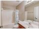 Standard bathroom featuring a tub, shower, vanity, and a framed mirror at 1554 Park Grove Dr, Lawrenceville, GA 30046