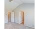Neutral bedroom features large doorways and neutral carpet at 1554 Park Grove Dr, Lawrenceville, GA 30046
