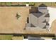 An aerial view showing the layout of the house on the property, the yard, and the patio at 1952 Azalea Dr, Lawrenceville, GA 30043