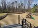 Expansive backyard with a play structure and a wood fence at 1952 Azalea Dr, Lawrenceville, GA 30043