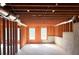 Unfinished basement ready for customization with exposed wood framing and natural light at 1952 Azalea Dr, Lawrenceville, GA 30043