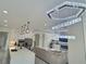 Open-concept living space featuring the kitchen, dining, and living areas with modern finishes at 1952 Azalea Dr, Lawrenceville, GA 30043