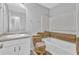 Bathroom featuring a single sink vanity with a large framed mirror at 2044 Teal Cv, Lithonia, GA 30058