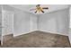 Bedroom featuring neutral walls, ceiling fan, and soft carpeting at 2044 Teal Cv, Lithonia, GA 30058