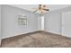 Comfortable bedroom featuring neutral walls and carpeting at 2044 Teal Cv, Lithonia, GA 30058