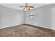 Bedroom featuring a neutral color palette, carpeting and ceiling fan at 2044 Teal Cv, Lithonia, GA 30058