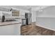 Modern kitchen with stainless steel appliances, wood floors and natural light at 2044 Teal Cv, Lithonia, GA 30058