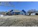 Expansive backyard view with a wooden deck, offering privacy and space at 2467 Sky Valley Dr, Dacula, GA 30019