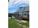 The backyard features a wood deck and stairs leading to a meticulously maintained lawn at 2467 Sky Valley Dr, Dacula, GA 30019