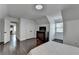 Spacious bedroom with hardwood floors, a closet and a dormer window at 2467 Sky Valley Dr, Dacula, GA 30019