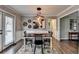This is a dining room with decor, dining table, and access to outdoors at 2467 Sky Valley Dr, Dacula, GA 30019