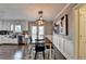 Charming dining room with modern lighting and stylish decor at 2467 Sky Valley Dr, Dacula, GA 30019