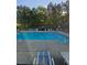 A large community pool with ample seating and lounge chairs perfect for summertime relaxation at 2467 Sky Valley Dr, Dacula, GA 30019
