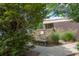 A tranquil stone wall and water feature in a peaceful landscaped area at 130 Arizona Ne Ave # 302, Atlanta, GA 30307