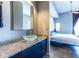 Elegant bathroom with a granite countertop and modern fixtures at 130 Arizona Ne Ave # 302, Atlanta, GA 30307