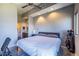 Spacious bedroom with modern lighting and an adjoining bathroom at 130 Arizona Ne Ave # 302, Atlanta, GA 30307