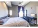 This bright bedroom offers a ceiling fan, a desk and a window with natural light at 130 Arizona Ne Ave # 302, Atlanta, GA 30307