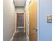Neutral hallway featuring modern doors and stylish lighting at 130 Arizona Ne Ave # 302, Atlanta, GA 30307