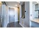 Modern hallway features granite countertop, updated appliances and access to the unit at 130 Arizona Ne Ave # 302, Atlanta, GA 30307