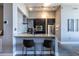 Modern kitchen features granite counters, stainless steel appliances, track lighting and a breakfast bar at 130 Arizona Ne Ave # 302, Atlanta, GA 30307