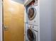 Convenient laundry area with stacked washer and dryer units at 130 Arizona Ne Ave # 302, Atlanta, GA 30307