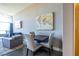 Inviting living area featuring sleek furnishings, a dining space, and a flood of natural light at 130 Arizona Ne Ave # 302, Atlanta, GA 30307