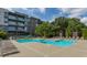 Upscale apartment complex boasting a stunning pool and lounge area for residents at 130 Arizona Ne Ave # 302, Atlanta, GA 30307