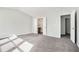 View of main bedroom with walk-in closet and open door at 1954 Durwood Ln, Duluth, GA 30096