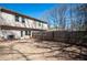 Spacious backyard featuring a wooden privacy fence and patio area at 2544 Castellan Dr, Atlanta, GA 30316