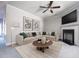 Inviting living room featuring a cozy sofa, stylish decor, and a sleek fireplace at 2544 Castellan Dr, Atlanta, GA 30316