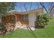 Backyard view of brick wall with door on a sunny day at 2675 Davidson Dr, Lithonia, GA 30058