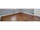 Clean bedroom with hardwood floors, window and neutral walls at 2675 Davidson Dr, Lithonia, GA 30058