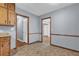 View of the home's kitchen with view through doorways at 2675 Davidson Dr, Lithonia, GA 30058