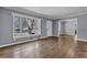 Bright living room features hardwood floors, neutral paint, and a large window at 2675 Davidson Dr, Lithonia, GA 30058