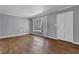 Spacious living room with hardwood floors, neutral walls, and natural light at 2675 Davidson Dr, Lithonia, GA 30058