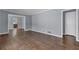 Hardwood floors, neutral walls, and an open layout define this versatile living space at 2675 Davidson Dr, Lithonia, GA 30058