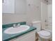Bathroom featuring a single sink vanity with a shower and toilet at 3021 Hampton Club Way, Lithonia, GA 30038