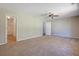 Large main bedroom featuring carpet flooring and an ensuite bathroom and closet at 3021 Hampton Club Way, Lithonia, GA 30038