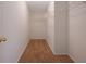 Walk-in closet with carpet flooring and wire shelving for organizing clothes and accessories at 3021 Hampton Club Way, Lithonia, GA 30038