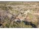 Aerial view of wooded property featuring mature trees and other residences nearby at 537 Pine Shadows Dr, Dallas, GA 30157