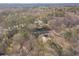 Distant aerial showing home surrounded by mature trees at 537 Pine Shadows Dr, Dallas, GA 30157