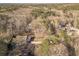 Aerial view of the home with surrounding trees and other homes at 537 Pine Shadows Dr, Dallas, GA 30157