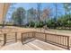 Deck overlooking the expansive fenced-in backyard, creating a perfect blend of indoor-outdoor living at 537 Pine Shadows Dr, Dallas, GA 30157