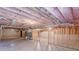 Unfinished basement featuring exposed ceiling and utilities, framed walls, and concrete flooring at 537 Pine Shadows Dr, Dallas, GA 30157