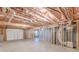 Spacious unfinished basement with concrete flooring, framed walls, and exposed ceiling and utilities at 537 Pine Shadows Dr, Dallas, GA 30157