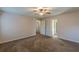 Large bedroom with carpet flooring, ceiling fan and multiple doorways for easy access at 537 Pine Shadows Dr, Dallas, GA 30157
