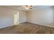 Bright bedroom featuring neutral walls, carpet flooring and access to the ensuite bathroom at 537 Pine Shadows Dr, Dallas, GA 30157