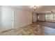 Cozy dining area with tile floor, ample lighting, and easy access to the living room at 537 Pine Shadows Dr, Dallas, GA 30157