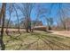 View of the home's exterior with covered parking at 537 Pine Shadows Dr, Dallas, GA 30157